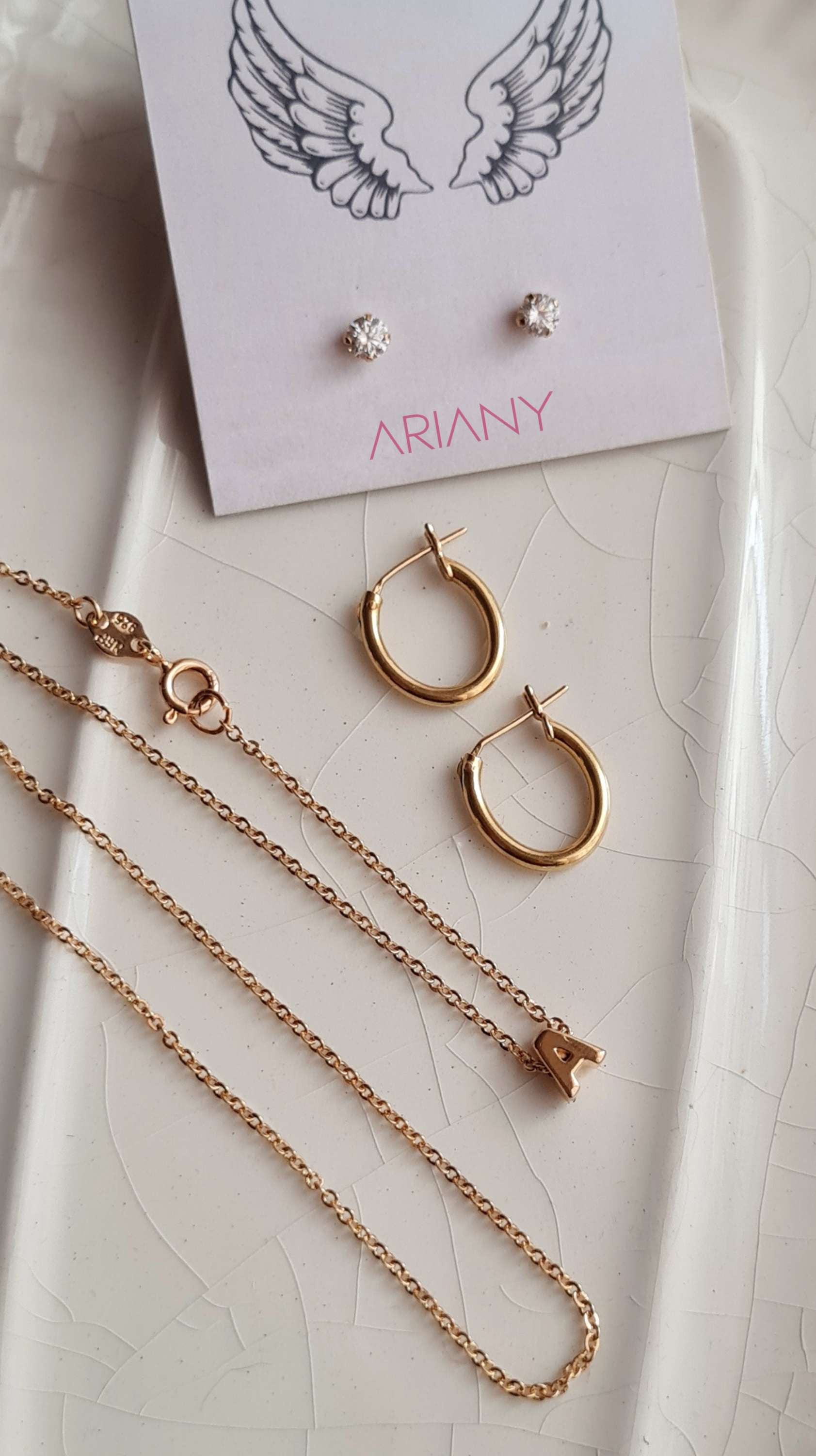 Aretes Abridor Punto de Luz Swarovski - Oro 18k