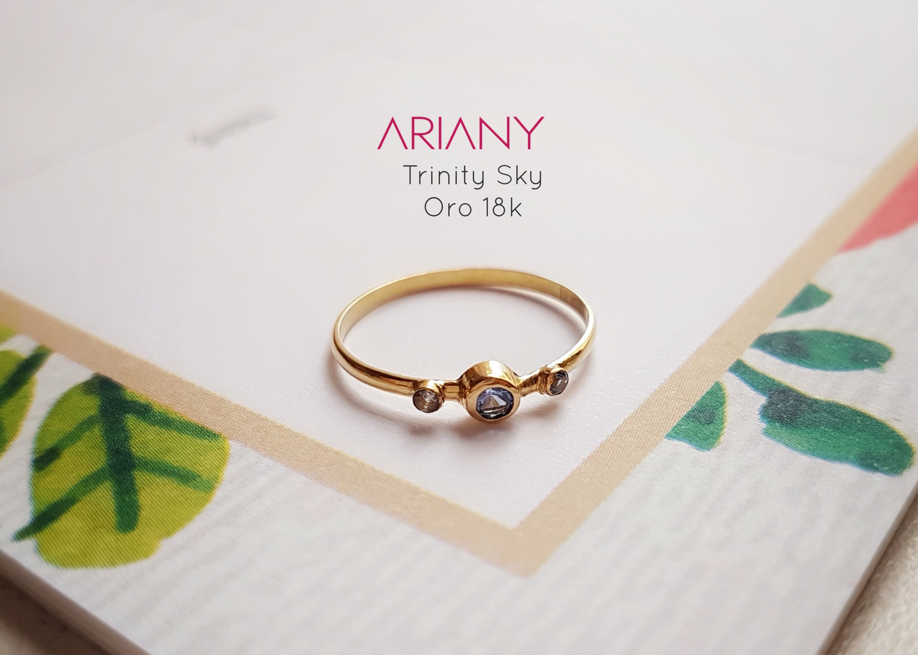 Anillo Tanzanita Trinity Sky - Oro 18k