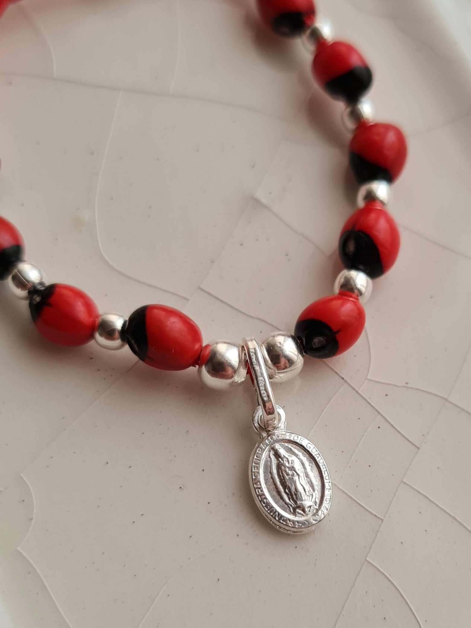Pulsera Huayruro & San Benito / Divino Niño / Guadalupe / M. Milagrosa - P925
