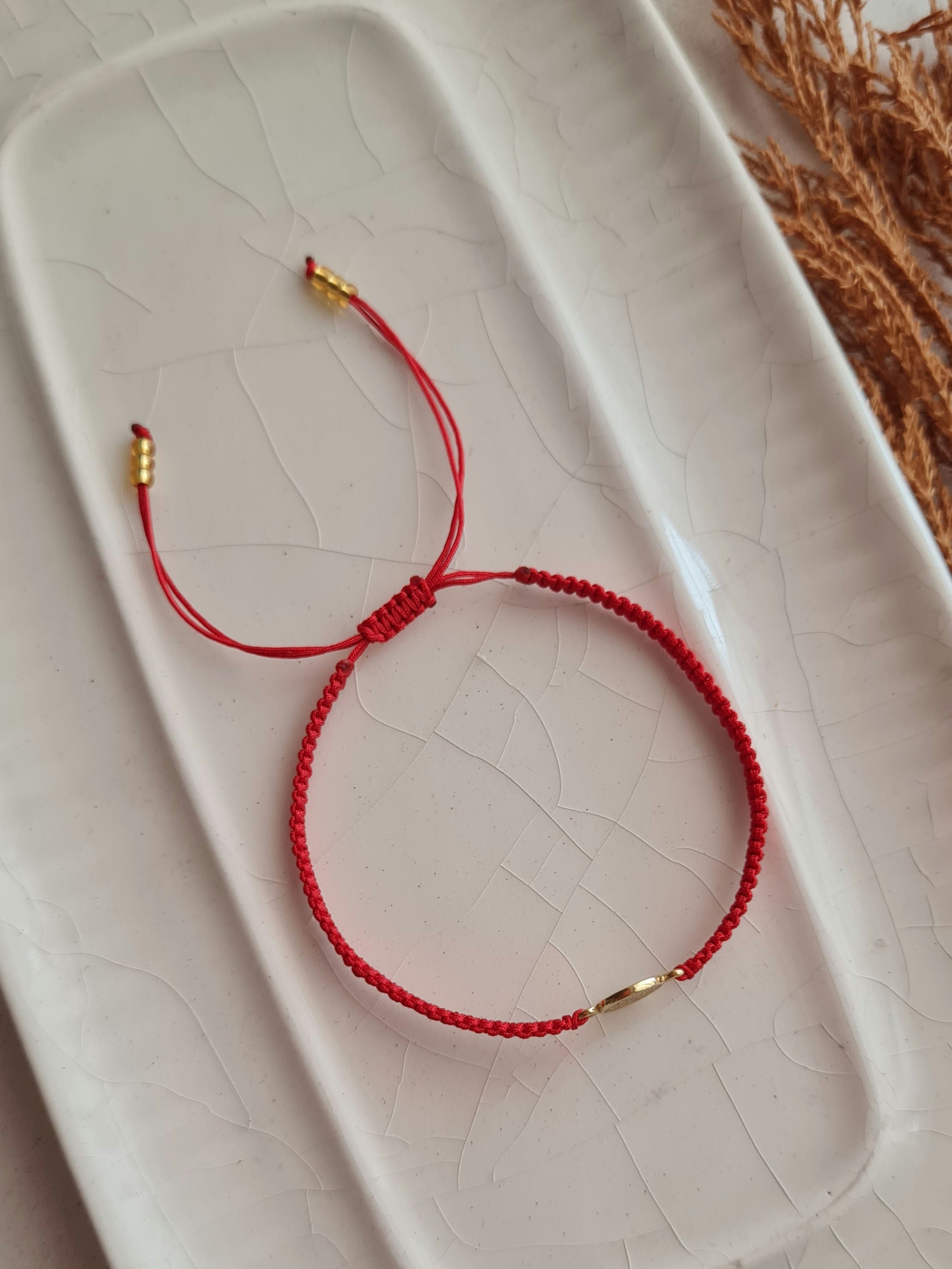 Pulsera San Benito Tejida - Oro 18k