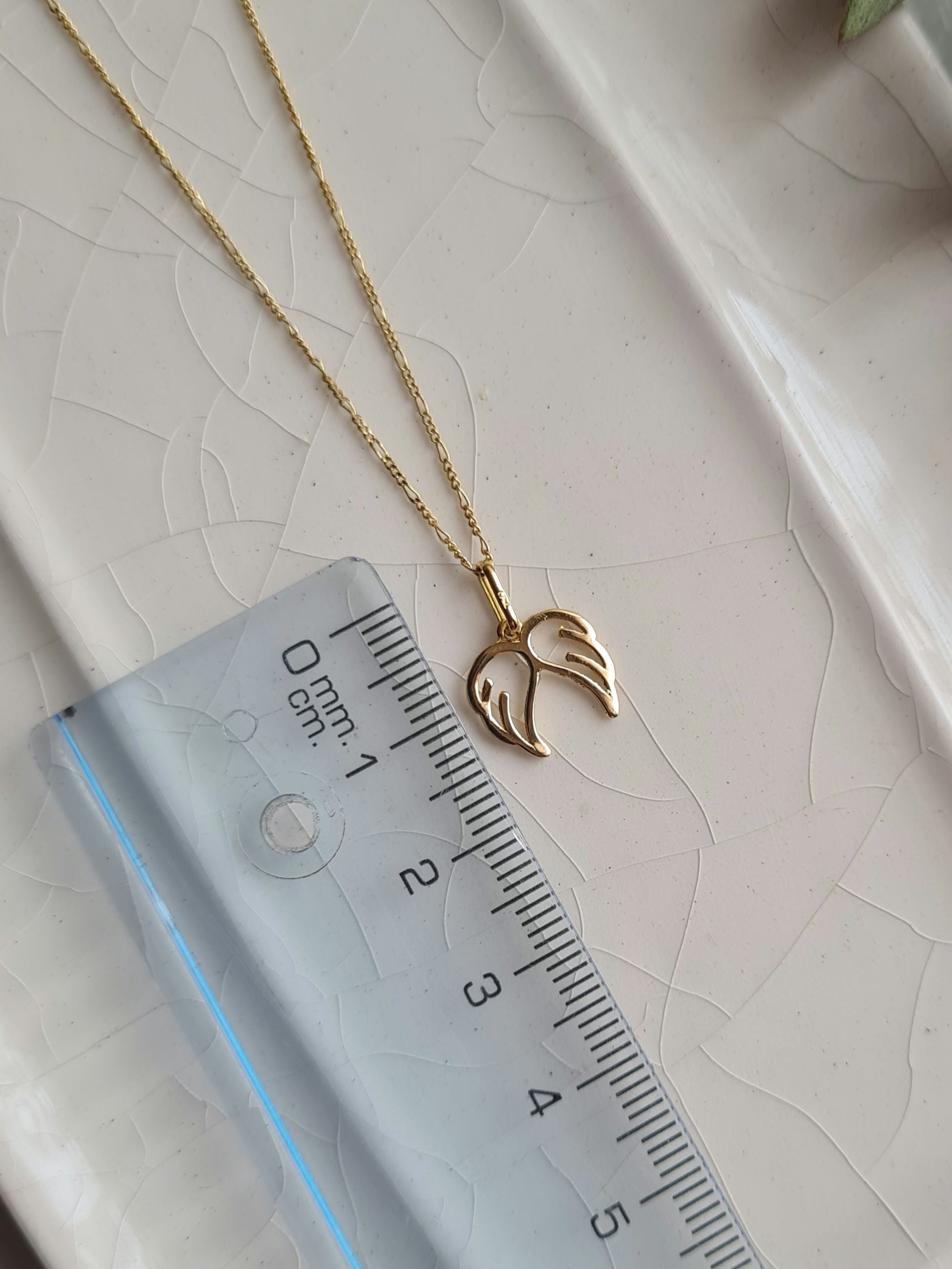 Dije Alas Charm - Oro 18k