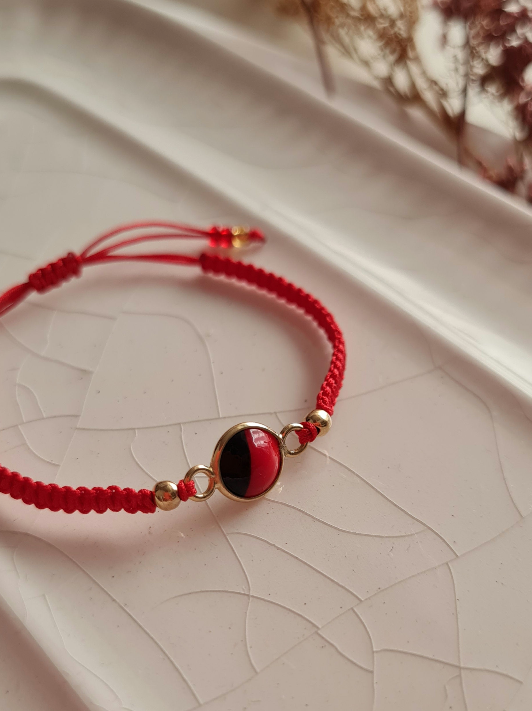 Pulsera Huayruro Tejida - Oro 18k