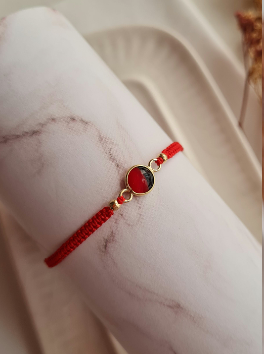 Pulsera Huayruro Tejida - Oro 18k
