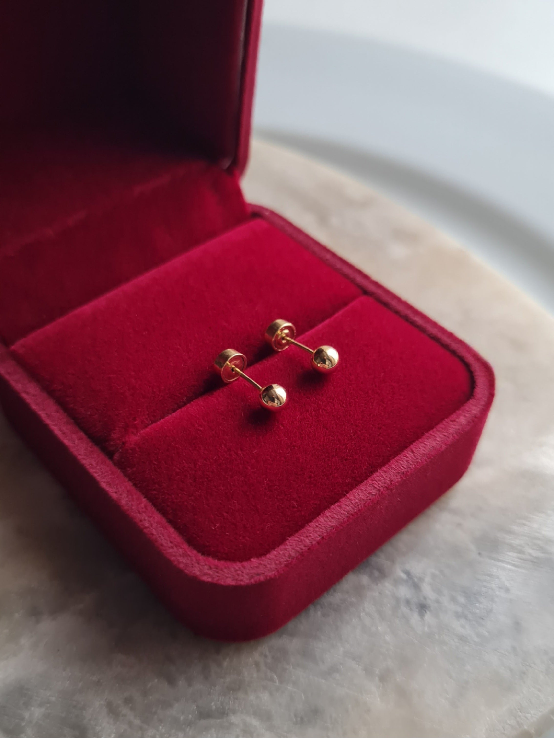 Aretes Bola c/Seguro Tambor - Oro 18k